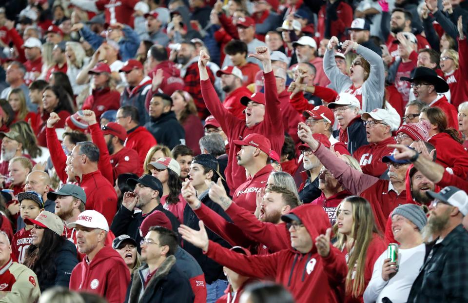 Oklahoma fans react in the second half of a college football game between the University of Oklahoma Sooners and the West Virginia Mountaineers at Gaylord Family-Oklahoma Memorial Stadium in Norman, Okla., Saturday, Nov., 11, 2023. Sarah Phipps, The Oklahoman