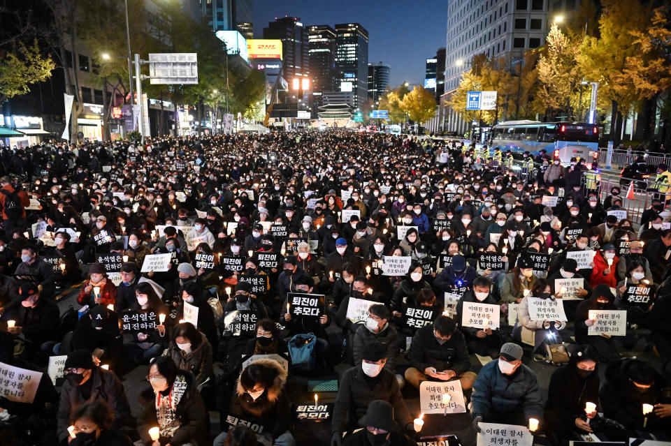 People take part in a candlelight vigil to commemorate the 156 people killed in the October 29 Halloween crowd crush in Seoul, South Korea, on Nov. 5, 2022. (Jung Yeon-je / AFP - Getty Images)