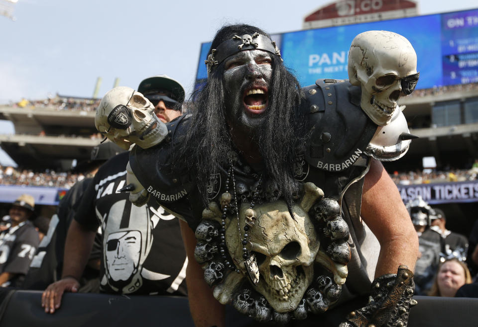 Raiders fans in the "Black Hole" always added to the festivities in Oakland. (AP Photo/Tony Avelar, File)