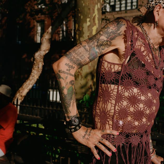 Reneé’s body is covered in tattoos, including an image on her right arm of Stonewall Inn, the way it was configured in the 1970s, with silhouettes of rioters in front of large flames. (Photo: Yael Malka)