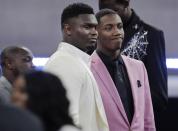 Duke's Zion Williamson, left, and RJ Barrett speak before the NBA basketball draft Thursday, June 20, 2019, in New York. (AP Photo/Julio Cortez)