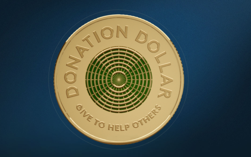 The Donation Dollar features a green and gold ripple design. Image: Royal Australian Mint. 