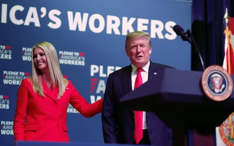 Donald Trump with his daughter Ivanka, who is a senior White House adviser - Credit: REUTERS/Carlos Barria