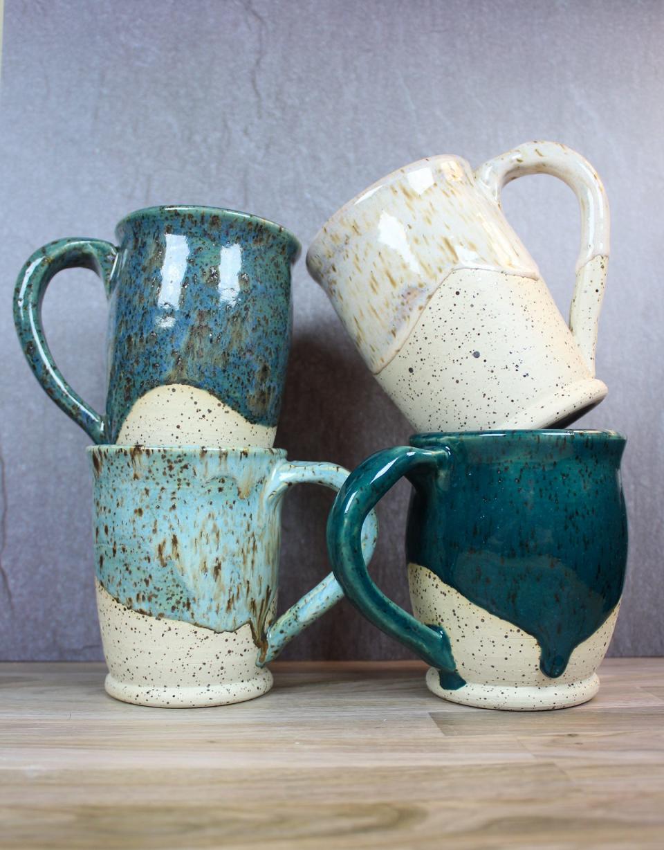 Cosmos mugs, among offerings at Tallahassee Clay Art’s third annual Handmade Holiclay Market on Dec. 3, 2022.