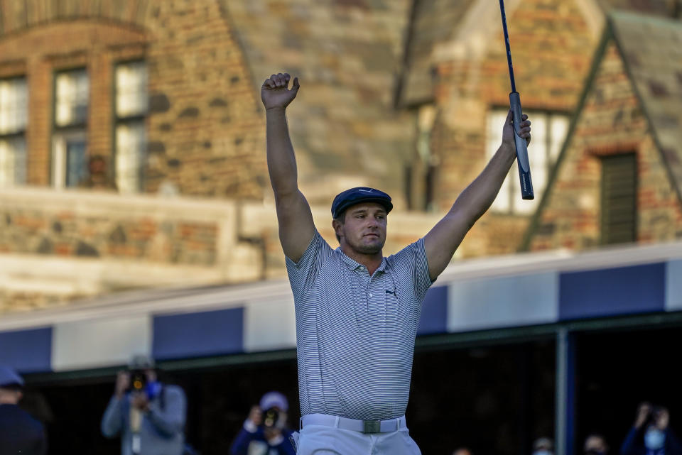 Bryson DeChambeau, of the United States, reacts after sinking a putt for par on the 18th hole to win the US Open Golf Championship, Sunday, Sept. 20, 2020, in Mamaroneck, N.Y. (AP Photo/Charles Krupa)