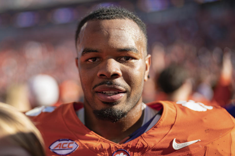 Clemson linebacker Jeremiah Trotter Jr. walks off the field after defeating Notre Dame during an NCAA college football game Saturday, Nov. 4, 2023, in Clemson, S.C. (AP Photo/Jacob Kupferman)