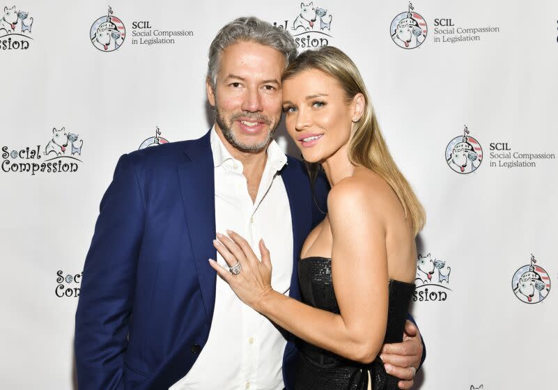 WEST HOLLYWOOD, CALIFORNIA - JANUARY 19: Joanna Krupa (R) and husband, Douglas Nunes attend the Social Compassion in Legislation Hosts "Sunset On Sunset" Event Honoring Animal-Rights Pioneers at Andaz West Hollywood on January 19, 2019 in West Hollywood, California. (Photo by Rodin Eckenroth/Getty Images)