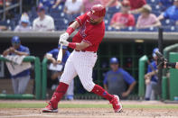Philadelphia Phillies' Kyle Schwarber lines out during the first inning of a spring training baseball game against the Toronto Blue Jays, Wednesday, March 23, 2022, in Clearwater, Fla. (AP Photo/Lynne Sladky)