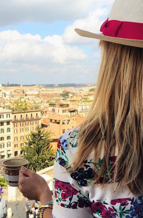 Coffee cup in hand, the actress surveyed the scene on a trip to Rome. Take us with you next time, Reese!