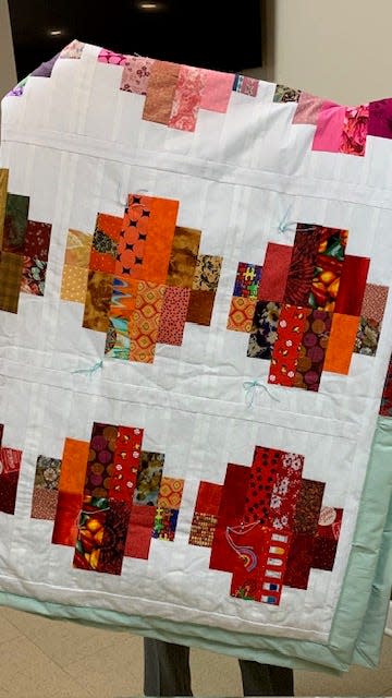 This hand-tied quilt will be part of Grace’s Flower Festival Silent Auction on Saturday, April 27.