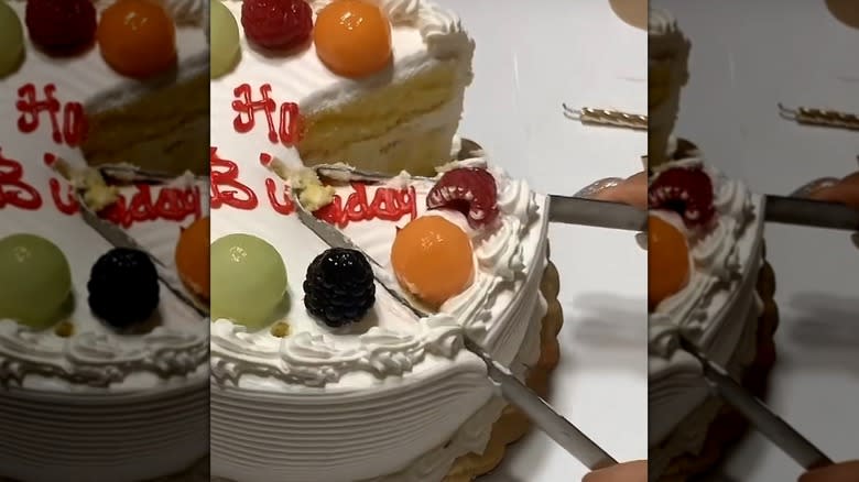 cutting cake with pom tongs