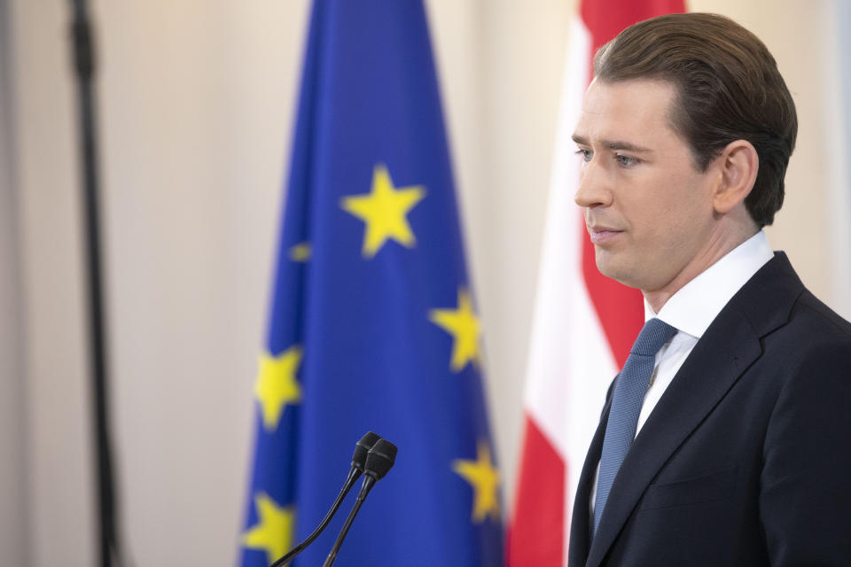 Former Austrian Chancellor Sebastian Kurz announces that he is quitting politics, two months after stepping down as leader amid corruption allegations, during a news conference in Vienna, Austria, Thursday, Dec. 2, 2021. (AP Photo/Lisa Leutner)