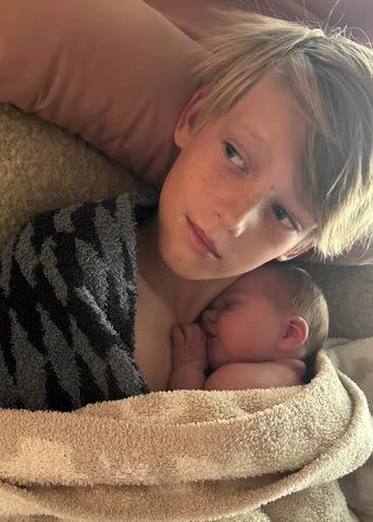 <p>Hilary Duff/Instagram</p> Duff's son Luca cuddles with newborn Townes