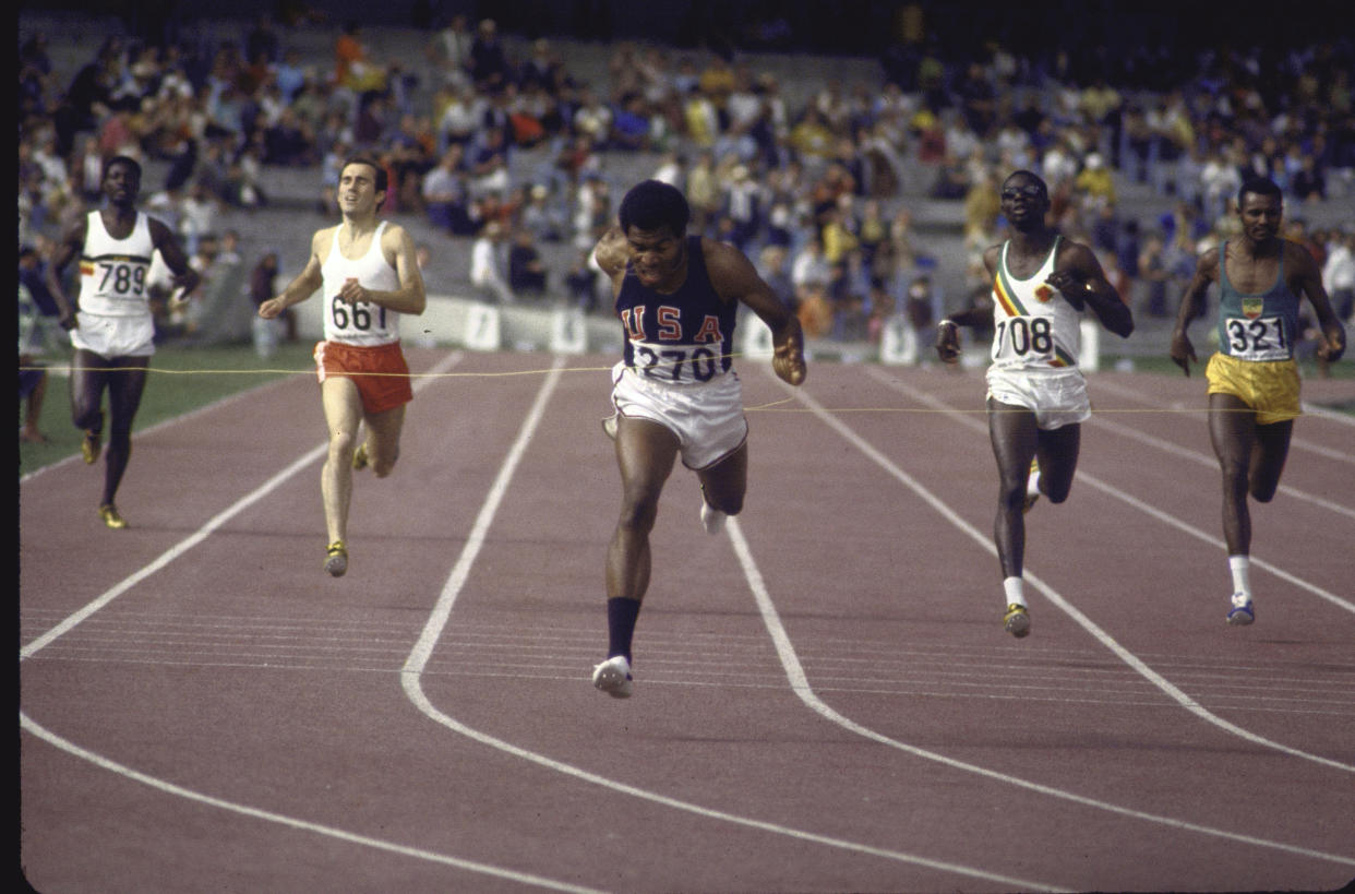 US athlete Lee Evans (C) going through finish line during race at Summer Olympics.  (Photo by Bill Eppridge/The LIFE Picture Collection via Getty Images)