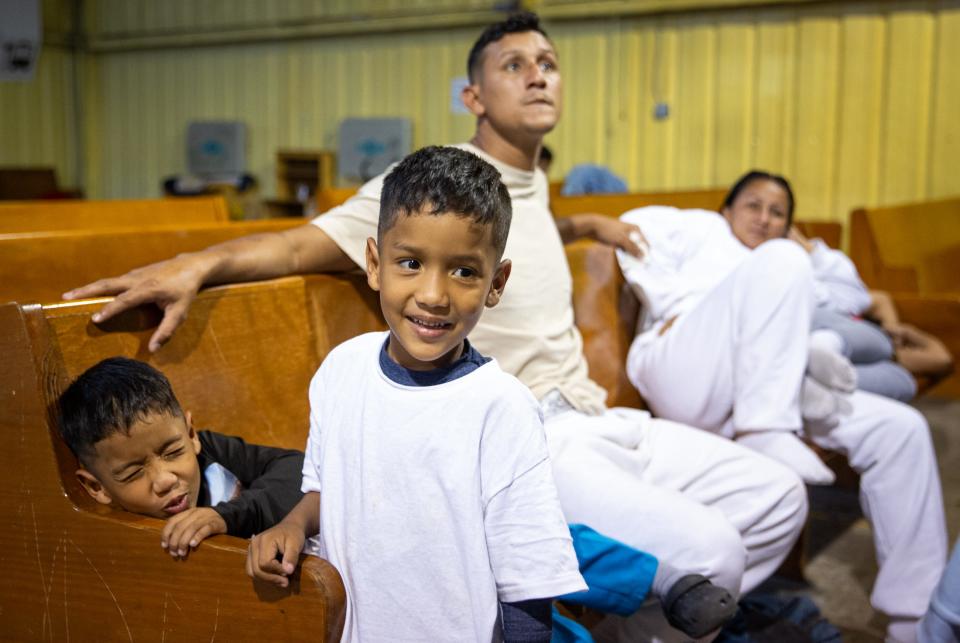 Omar Tortua, 27, Yamilet Castillo, 31, Jesús, front, and Elias, 5, from Venezuela, arrived at Mission: Border Hope on Friday in Maverick County, Texas. After being snared in razor wire and handed over to Border Patrol, they were released until their court date. Omar wondered why the wire was needed "if they were just going to arrest us and let us go."