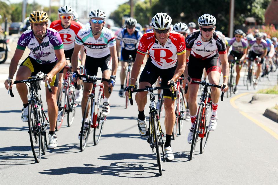 Lance Armstrong of the US (R) takes part in a ride with members of the public in prepartation for the upcoming Tour Down Under cycling event in Adelaide on 15 January 2011. The Tour Down Under cycling event will be held from January 16-23. IMAGE STRICTLY RESTRICTED TO EDITORIAL USE STRICTLY NO COMMERCIAL USE AFP PHOTO / MARK GUNTER (Photo credit should read Mark Gunter/AFP/Getty Images)