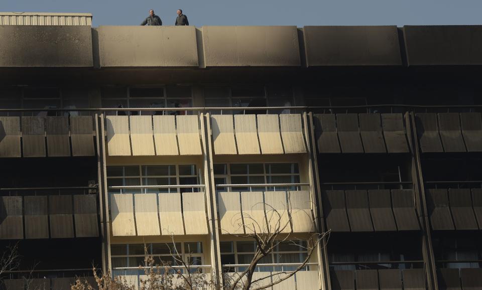 <p>Afghan security personnel are seen on the rooftop of the Intercontinental Hotel in Kabul on January 22, 2018, following an attack on the hotel.(Photo: Wakil Kohsar/AFP/Getty Images) </p>