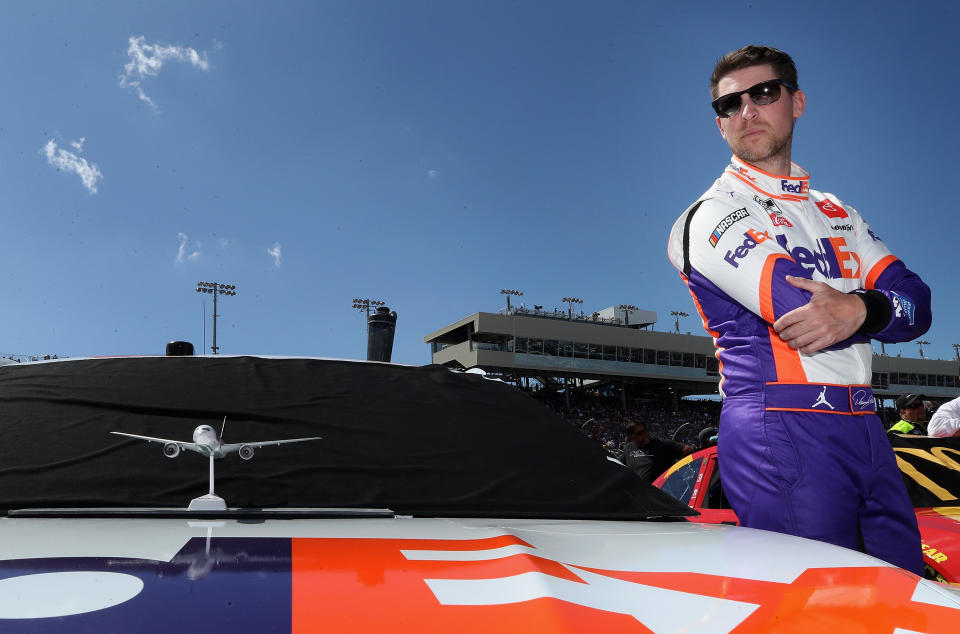 AVONDALE, ARIZONA - MARCH 08: Denny Hamlin, driver of the #11 FedEx Freight Toyota, stands on the grid before the NASCAR Cup Series FanShield 500 at Phoenix Raceway on March 08, 2020 in Avondale, Arizona. (Photo by Christian Petersen/Getty Images)