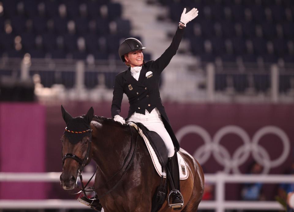 Jessica von Bredow-Werndl of Team Germany riding TSF Dalera reacts after competing in the Dressage Individual Grand Prix Freestyle Final  - Julian Finney/Getty Images