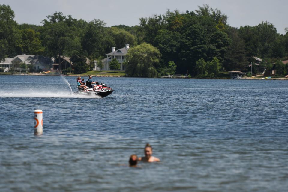 Located in Meridian Township about 10 miles east of Lansing, this lake area features plenty of water activity plus a beach, playground, nature trail and more.