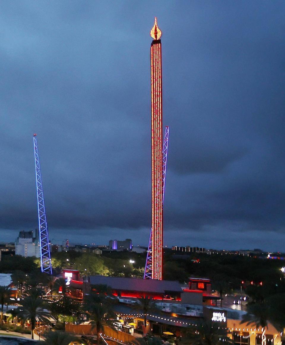 The Orlando FreeFall ride is shown at ICON Park in Orlando, Fla., on Thursday, March 24, 2022.  A 14-year-old boy fell to his death from a ride at an amusement park in Orlando, sheriff's officials said. Sheriff's officials and emergency crews responded to a call late Thursday at Icon Park, which is located in the city's tourist district along International Drive. The boy fell from the Orlando Free Fall ride, which opened late last year.