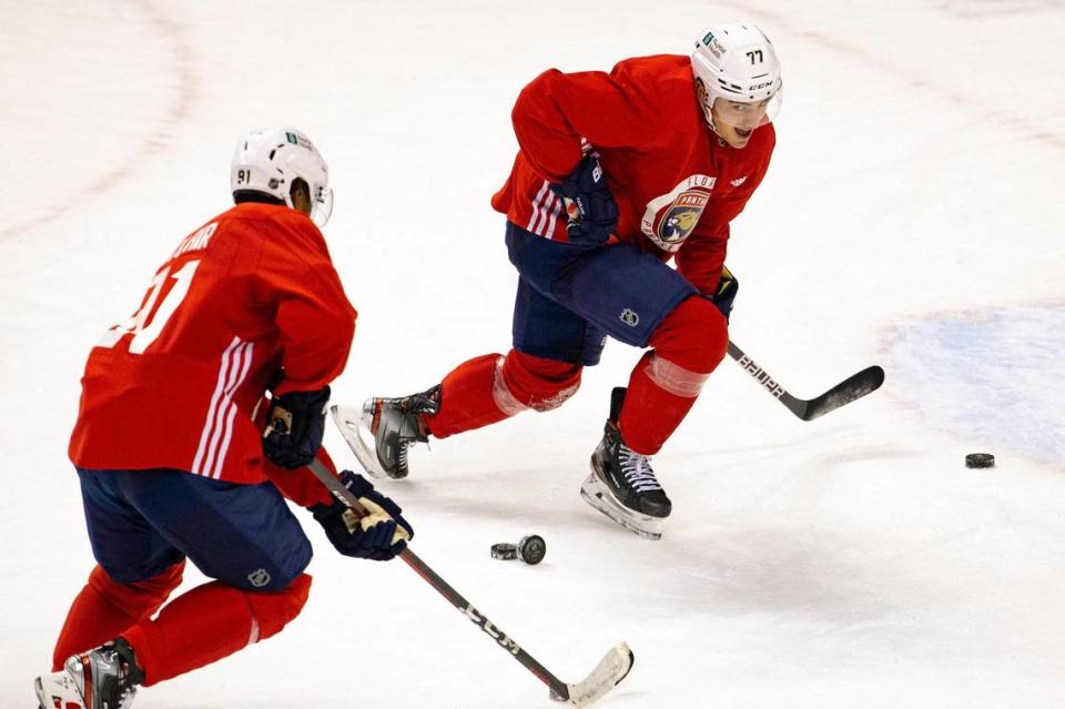 Florida Panthers center Frank Vatrano (77) and Panthers left wing Anthony Duclair (91) running drills during training camp in preparation for the 2021 NHL season at the BB&T Center on Sunday, January 10, 2021 in Sunrise.