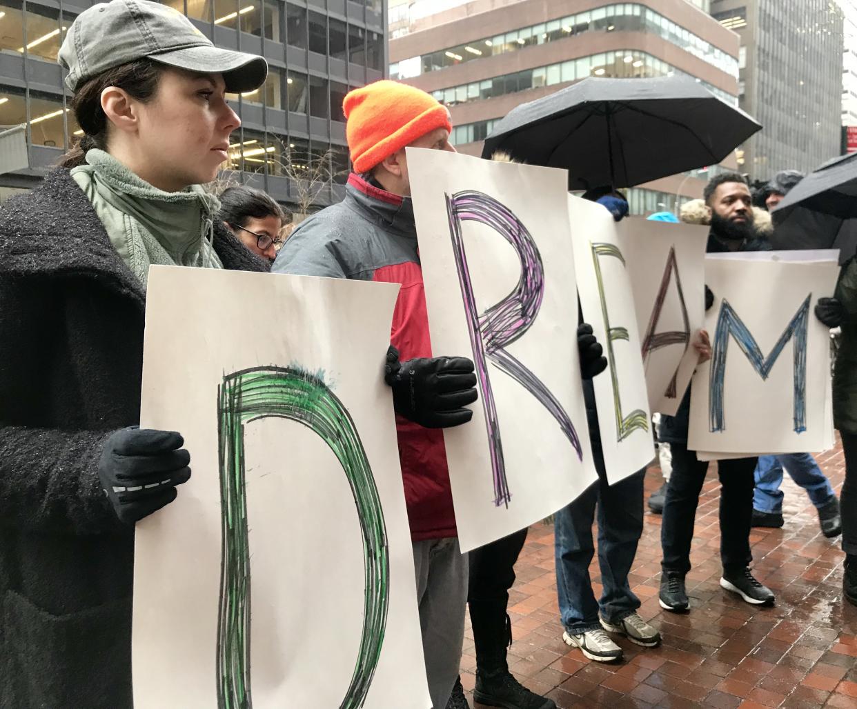 Immigration advocates outside the office of Sen. Chuck Schumer