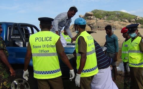 Sri Lankan police remove the body of 24-year-old British journalist, Paul McClean - Credit: Sri Lanka Daily Mirror 