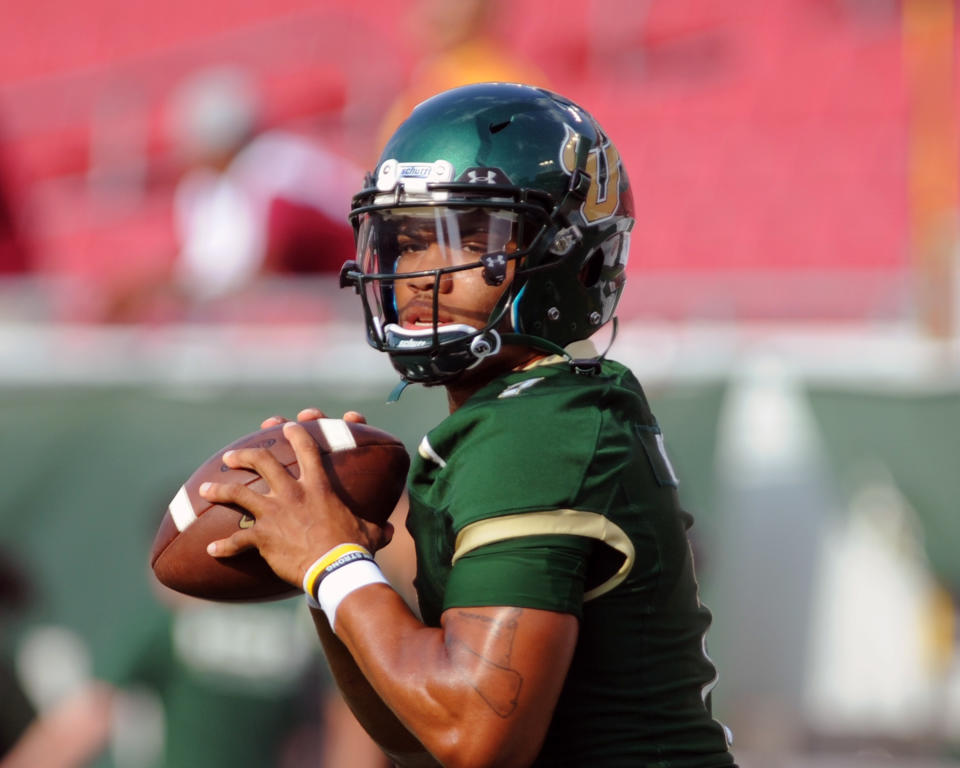 Quarterback B. J. Daniels #7 of the South Florida Bulls warms up for play against the Florida State Seminoles September 29, 2012 at Raymond James Stadium in Tampa, Florida. (Photo by Al Messerschmidt/Getty Images)