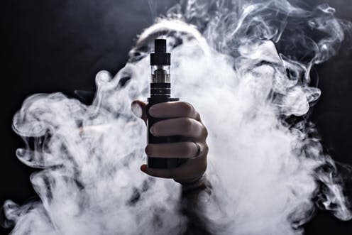 <span class="caption">Safe smoke?</span> <span class="attribution"><a class="link " href="https://www.shutterstock.com/image-photo/girl-soars-on-black-background-vape-557796589?src=jpJQoRC2TNDaTpP35K6Egg-1-1" rel="nofollow noopener" target="_blank" data-ylk="slk:Shutterstock;elm:context_link;itc:0;sec:content-canvas">Shutterstock</a></span>