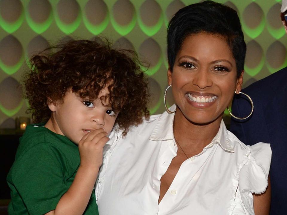 <p>Michael Simon/Shutterstock</p> Tamron Hall with her son Moses at the Buffalo Bills v New York Jets game on Nov. 6, 2022.