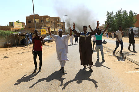 Sudanese demonstrators chant slogans near the home of a demonstrator who died of a gunshot wound sustained during anti-government protests in Khartoum, Sudan January 18, 2019. REUTERS/Mohamed Nureldin Abdallah