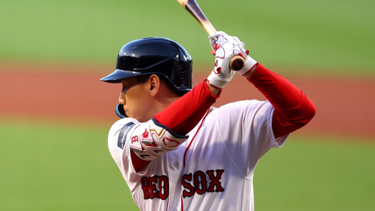  Masataka Yoshida #7 of the Boston Red Sox warms up in the on deck circle  