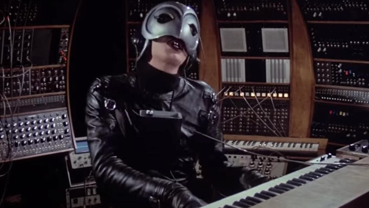  The Phantom sings as he plays the keyboard in Phantom of the Paradise. 