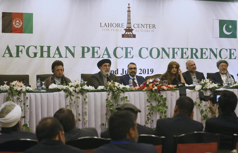 Afghan Warlord Gulbuddin Hekmatyar, leader of Islamist organization Hezb-i-Islami, second left, delivers his speech during an Afghan Peace Conference in Bhurban, 65 kilometers (40 miles) north of Islamabad, Pakistan, Saturday, June 22, 2019. Dozens of Afghan political leaders attended a peace conference in neighboring Pakistan on Saturday to pave the way for further Afghan-to-Afghan dialogue. (AP Photo/Anjum Naveed)