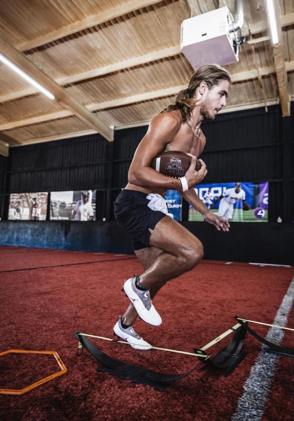 Erik McCarty Jr., a defensive back at OU and former McAlester star, goes through a drill at C4 Sports Performance & Fitness in Durant.