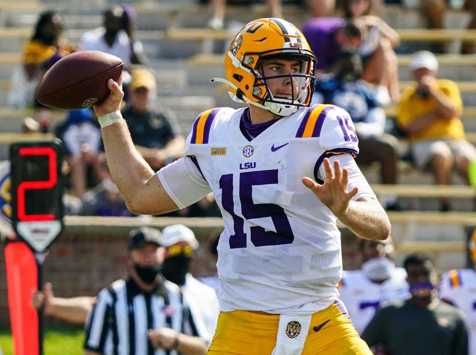 LSU quarterback Myles Brennan throws a pass against Missouri during the first half at Faurot Field at Memorial Stadium in Columbus, Missouri.