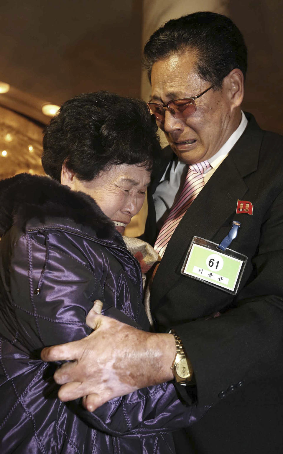 South Korean Lee Son-hyang, 88, left, and her North Korean brother Lee Yoon Geun ,72, get emotional as they reunite during the Separated Family Reunion Meeting at Diamond Mountain resort in North Korea, Thursday, Feb. 20, 2014. The rival nations struck a deal last week to go ahead with brief meetings of war-divided families, though there's wariness in Seoul that Pyongyang could back out again. As they waited anxiously in the days leading up to the trip, many elderly Koreans had been unsure whether they would be able to see their long-lost relatives' faces before they die. (AP Photo/Yonhap, Lee Ji-eun) KOREA OUT