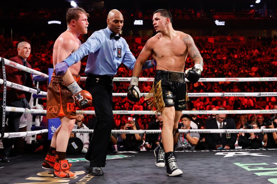 LAS VEGAS, NEVADA - SEPTEMBER 14: Referee Harvey Dock separates WBC/WBA/WBO super middleweight champion Canelo Alvarez and Edgar Berlanga at the end of the 11th round during a title fight at T-Mobile Arena on September 14, 2024 in Las Vegas, Nevada. (Photo by Steve Marcus/Getty Images)