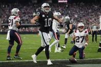 Las Vegas Raiders wide receiver Mack Hollins celebrates after a touchdown reception during the first half of an NFL football game between the New England Patriots and Las Vegas Raiders, Sunday, Dec. 18, 2022, in Las Vegas. (AP Photo/John Locher)