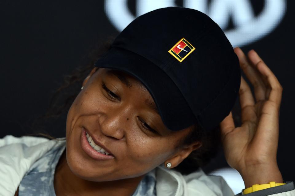 Naomi Osaka has learned to deal with the increased media coverage that comes with winning. (Photo by MANAN VATSYAYANA/AFP via Getty Images)