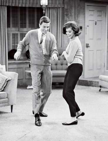 <p>CBS via Getty</p> From left: Dick Van Dyke (as Rob Petrie) and Mary Tyler Moore (as Laura Petrie) on "The Dick Van Dyke Show"