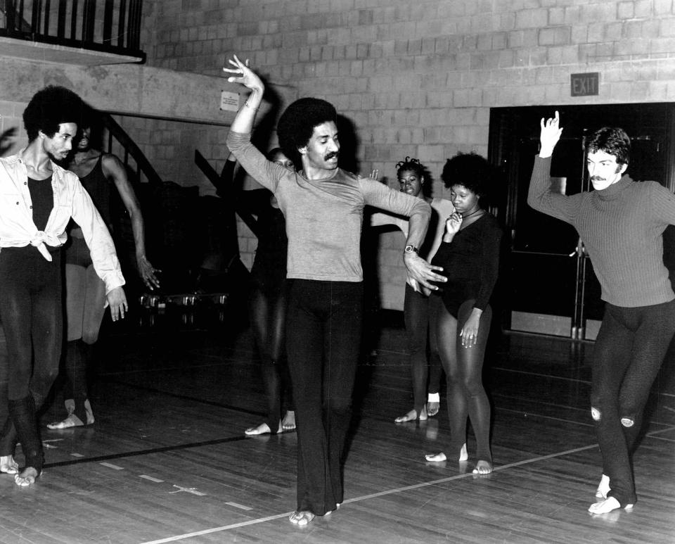 Garth Fagan demonstrates for dancers in this photo from 1974.
