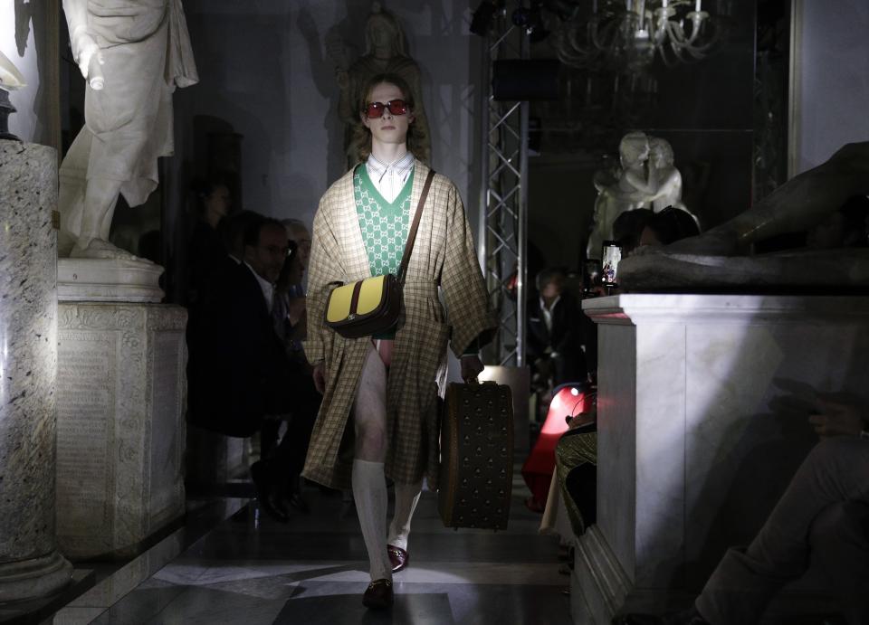 A model wears a creation as part of the Gucci cruise collection that was presented at the Capitoline Museums in Rome, Tuesday, May 28, 2019. (AP Photo/Andrew Medichini)