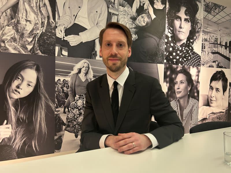 Swedish clothing retailer H&M's new CEO Erver poses after an interview in Stockholm