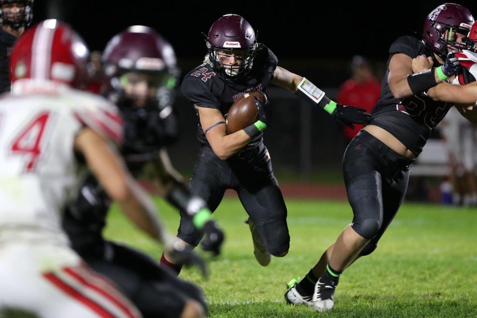 Morgan’s Jett Salmon runs with the ball during a varsity football game against Grantsville at Morgan High in Morgan on Friday, Sept. 30, 2022. Morgan was one of three teams to finish the 2022 season undefeated and looks to stretch its winning streak into the new year. | Kristin Murphy, Deseret News