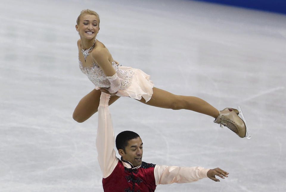 Aliona Savchenko and Robin Szolkowy of Germany perform during pairs free programs of the ISU Grand Prix Final figure skating in Fukuoka, western Japan, Saturday, Dec. 7, 2013. (AP Photo/Shizuo Kambayashi)