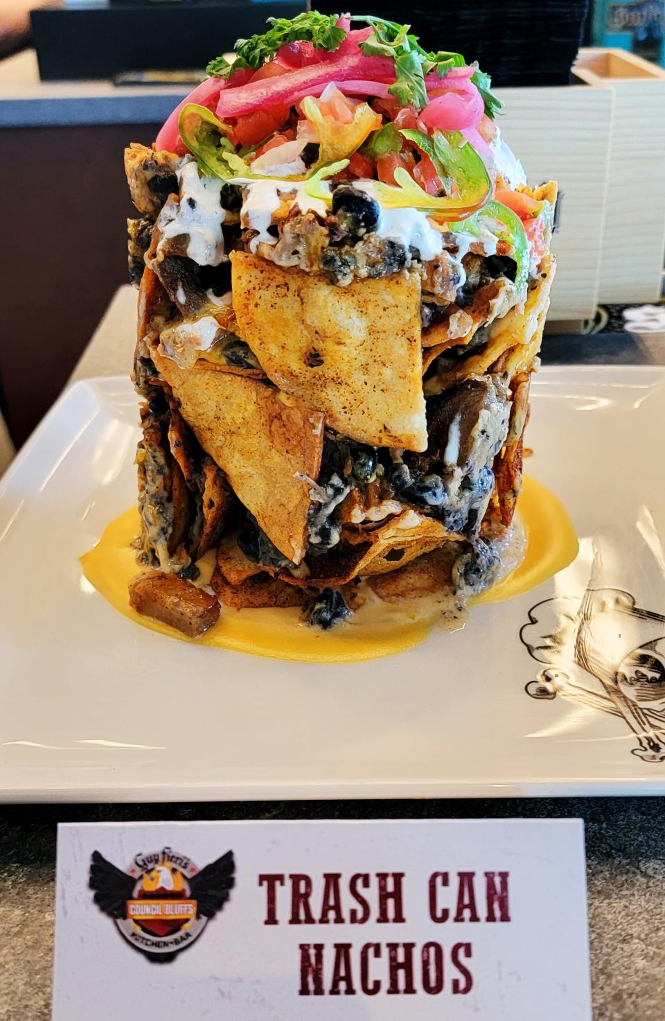 Trash Can Nachos at Guy Fieri's Kitchen + Bar in Council Bluffs is one of the staple dishes on a Fieri menu.