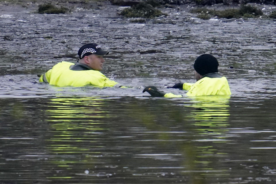 SOLIHULL, ENGLAND - DECEMBER 12: Emergency workers continue the search for further victims after a number of children fell through ice on a lake, on December 12, 2022 at Babbs Mill Park in Solihull, England. Three boys aged eight, 10 and 11 have died after falling through an icy lake last night. The search continued for more potential victims, following reports more children were present on the ice at the time of the incident. (Photo by Christopher Furlong/Getty Images)