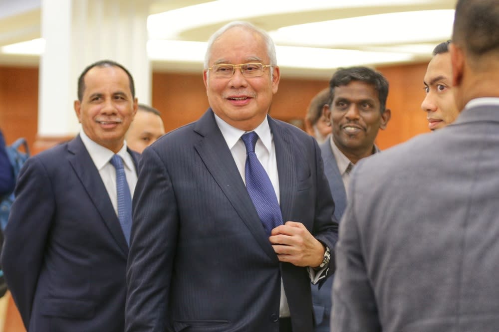 Datuk Seri Najib Razak is pictured at the Parliament lobby October 15, 2019. — Picture by Ahmad Zamzahuri